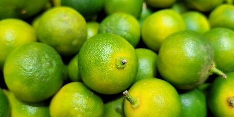 Close-up Image of Fresh Green Limes with Vibrant Textures and Colors, the Citrus Fruits are Beautifully Arranged