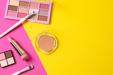 Professional decorative cosmetics, make-up products and accessories on color background, minimal style. Beauty, fashion, visage and shopping blogger concept