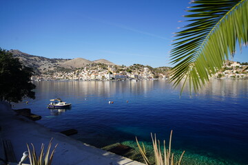 boat in the harbour of Symi island , picturesque greek village