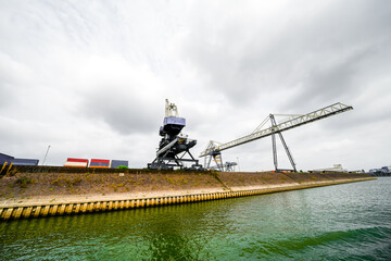 Fototapeta premium View of the surrounding area at the harbor in Duisburg. Industrial port on the Ruhr.