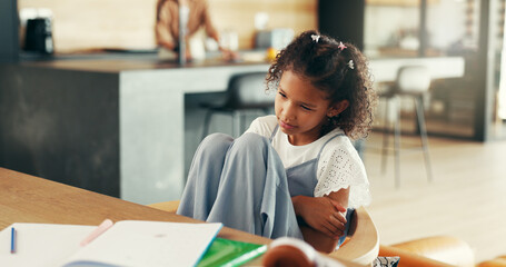 Girl, child and sick of stomach ache in home with homework, belly discomfort and tummy virus....