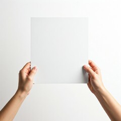 hands holding blank paper mockup
