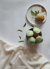 Ice-cream and Pear on a white background
