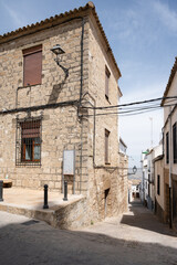 Stone facade street in Sabiote, Jaén, Spain, a historic and picturesque town