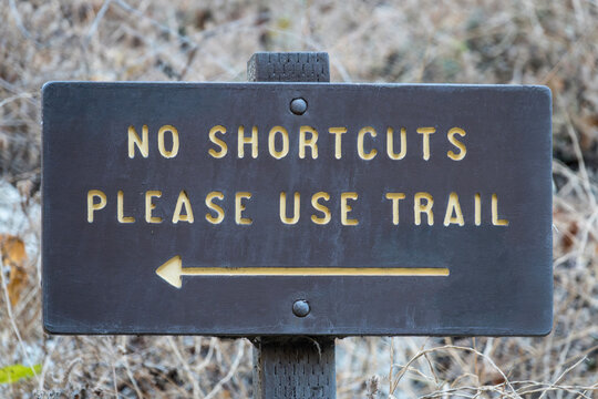 No shortcuts please use trail sign in the Angeles National Forest.
