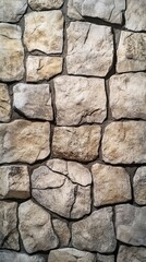 Obraz premium Stone Wall Texture: A close-up view showcases the rugged beauty of a stone wall, with its textured surface. The image highlights the variations in color and the intricate patterns.