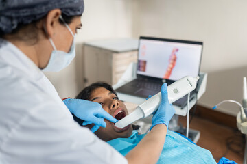 Dentist Using an Intraoral Scanner for a 3D Model of the Mouth