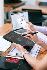 Business people team working at office with tablet and document, doing planning analyzing the...