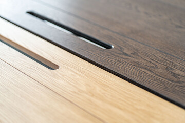 Empty rough wooden table top in the dark room