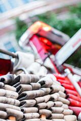 Close-Up of Folded Socks in a Vibrant Retail Display with Red and Orange Accents in an Urban Street Market Setting