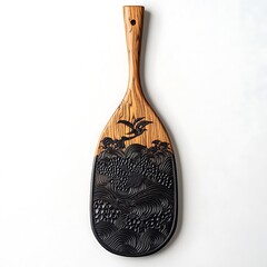 Anime rice paddle with embossed patterns on a white background