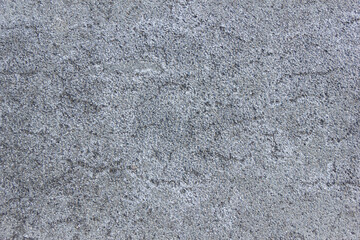 Asphalt background. Dark grey bitumen texture.