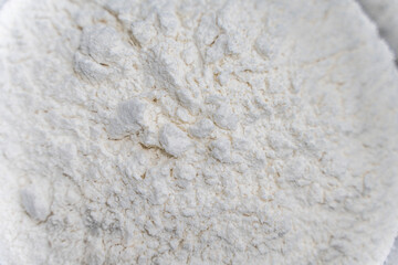 Background with the texture of wheat flour. Close-up. Copyspace.