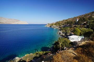 Fototapeta premium panorama of the clear water of Symi island , Greece