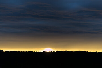 scenic beautiful sunset over the palisades of new jersey seen from fort tryon park manhattan new york city (nyc colorful sky) looking towards fort lee across hudson river stunning gorgous incredible
