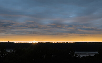 scenic beautiful sunset over the palisades of new jersey seen from fort tryon park manhattan new york city (nyc colorful sky) looking towards fort lee across hudson river stunning gorgous incredible