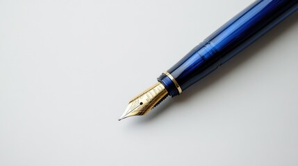 A single blue feather ink pen resting elegantly on a clean white surface, isolated for a minimalist aesthetic
