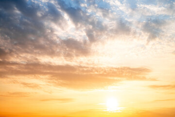 Sky,sunset, beautiful , luxury soft gradient orange gold clouds and sunlight on the blue sky perfect for the background, Sunrise on morning or everning in winter warm time ,Twilight summer,silhouette
