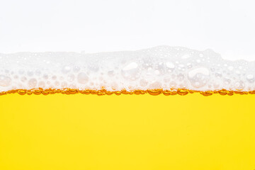 Close up bright orange Oil or beer splash texture and nature waves, Beautiful waves curve and little bubbles smooth for graphic design and background, Oil Bubbles, Soft beer bubbles, Selective focus
