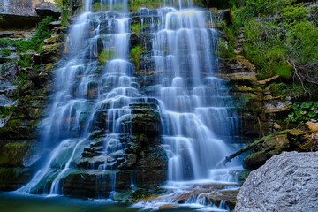 Fairy Alferello falls in The National Park of the Casentino Forests with silk effect during autumn...