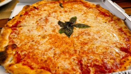 Big cheese pizza in lunch time , Food and drink photo.