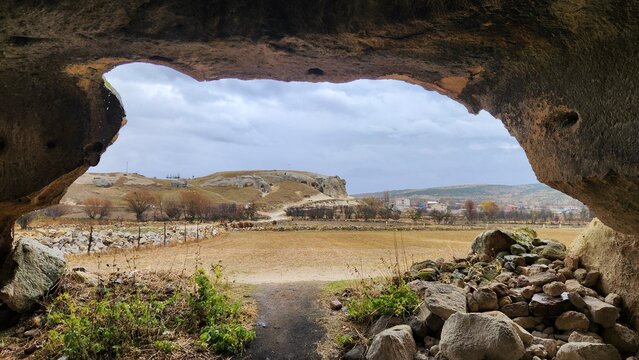 View of Uclerkayasi from the door of the Rock-cut Mythological Dungeon (Mitolojik Zindan) in Uclerkayasi village in Ihsaniye district in Afyonkarahisar province in the western Anatolia in Turkey.