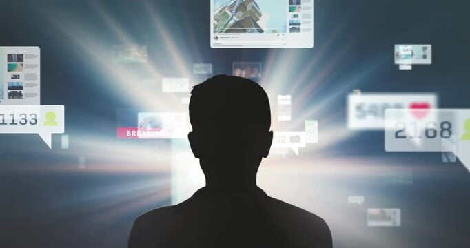 Black silhouette of a person is overwhelmed by social media postings, flying content video and images, concept media consumption