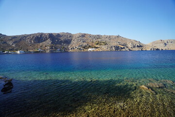 Obraz premium picturesque and relaxing destination , Emporios beach on Symi island