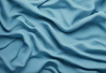Fototapeta premium Piece of light blue fabric with a smooth texture.