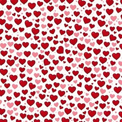 Lovely Hearts Pattern: A delightful seamless pattern featuring a scattering of red and pink hearts, perfect for Valentine's Day designs and romantic projects.