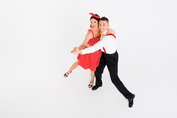 Photo of attractive lovely couple professional dancers duet dance tango rumba rhythm isolated on...