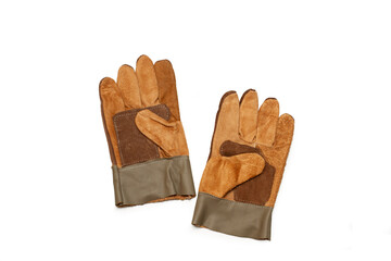 A pair of brown leather work gloves on a white background with copy space