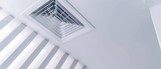 Naklejka premium An abstract view of geometric ceiling patterns formed by layered whorls creates a striking visual effect against shadows and light, evoking modernity.