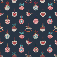 Seamless pattern of hand drawn vintage Christmas ornaments including baubles, heart, bird, scallop with bows on dark background. Vector design for wallpaper, textile, wrapping paper and greeting cards
