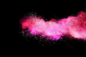 Abstract powder splatted background. red pink powder explosion on black background. Colored cloud. Colorful dust explode. Paint Holi	