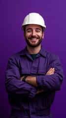 engineer man smiling at camera on purple background with copy space vertically 9:16