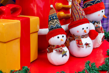 three cute Christmas snowmen at horizontal composition