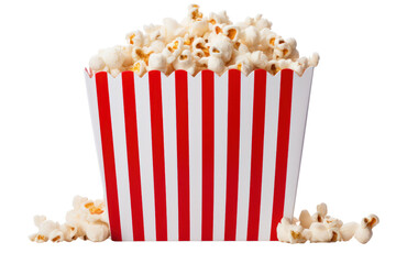 A vibrant striped popcorn box overflowing with freshly popped popcorn, with some kernels spilling out onto the surface. The box has a playful design with alternating red and white stripes.