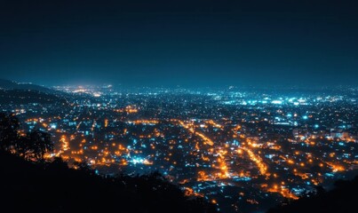 Obraz premium Night cityscape with illuminated buildings and streets.