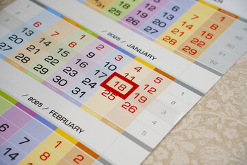 the red frame on eighteen on the calendar sheet. Appointment scheduling. anticipation of an...