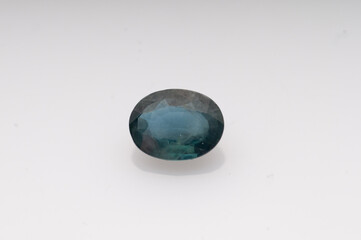 Stunning Natural Sapphire Gemstone with Rich Hues and Intricate Faceting
