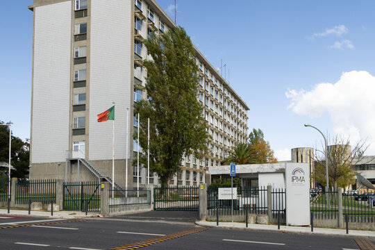 Ipma headquarters waving portuguese flag in lisbon, portugal