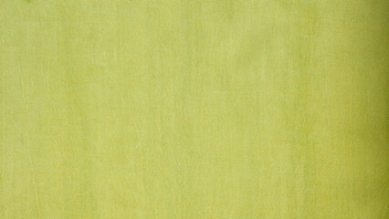 Green fabric texture background close up