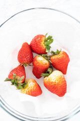 Washed and Dried Strawberries Neatly Stored in a Glass Bowl