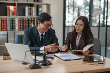 Lawyer and team Discuss problems and work related to legal work.