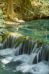 Naklejka premium A gorgeous waterfall captured in long exposure, Thailand.
