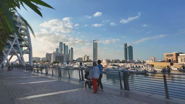 Abu Dhabi Modern Skyline Reflected in Al Bateen Marina. UAE capital city