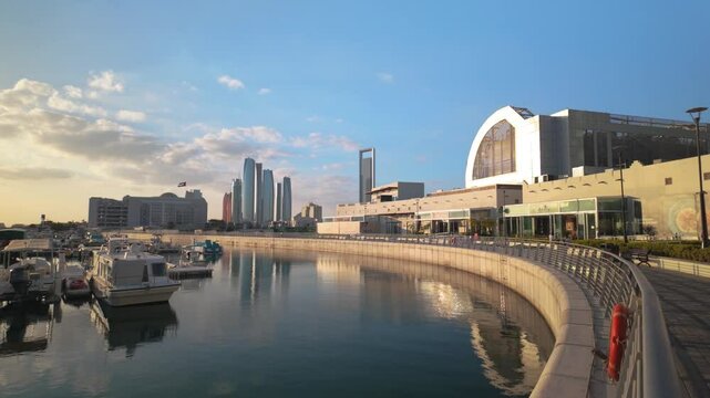 Abu Dhabi Modern Skyline Reflected in Al Bateen Marina. UAE capital city