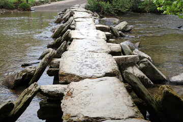 Close up view of Tarr Steps clapper bridge, Somerset England

