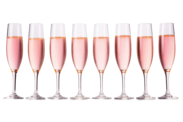 Sparkling rose champagne filling a row of stylish glasses, with a soft pink gradient in the background, isolated on white background